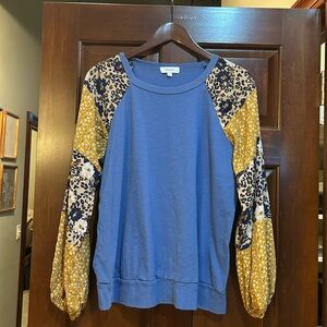 Chic Blue Women's Topwith Patterned Sleeves